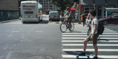 New York Skateboarder waiting for traffic lights. Image by Thiery for Australian-Photo.com